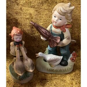 Set of Vintage M.I. Hummel Porcelain Boy with Umbrella and Celluloid Goose Girl